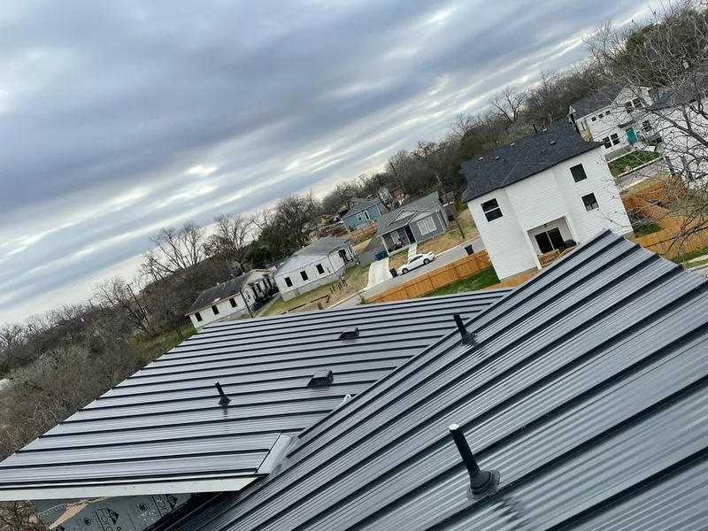Standing seam metal roof panels with vents for Skylight Repair in Calera